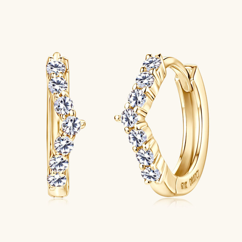 Small gold hoop earrings with moissanite stones