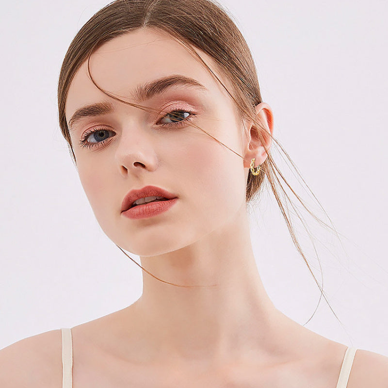 Gold huggie earrings professional elegant look