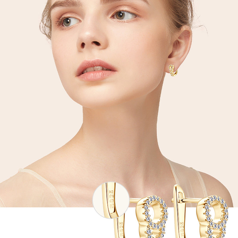 Luxury moissanite earrings featuring flat back construction in 14K gold