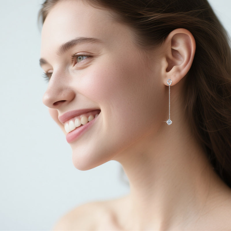 Professional woman wearing moissanite studs in modern workplace setting