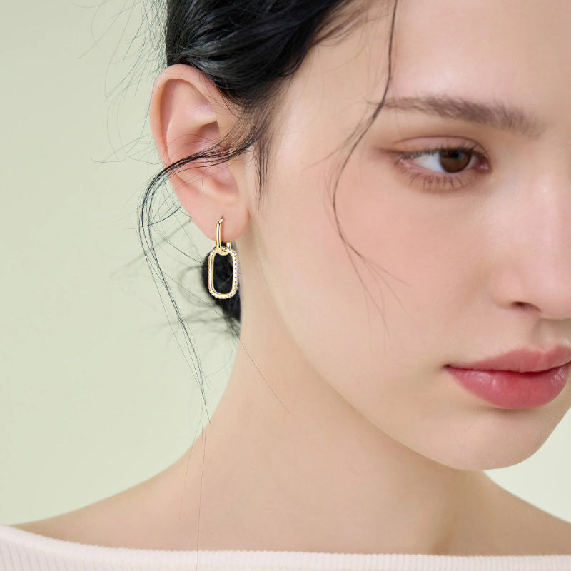 14K gold earrings with secure backing system detail