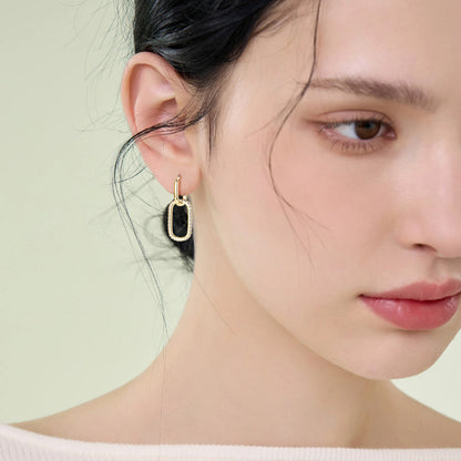 14K gold earrings with secure backing system detail