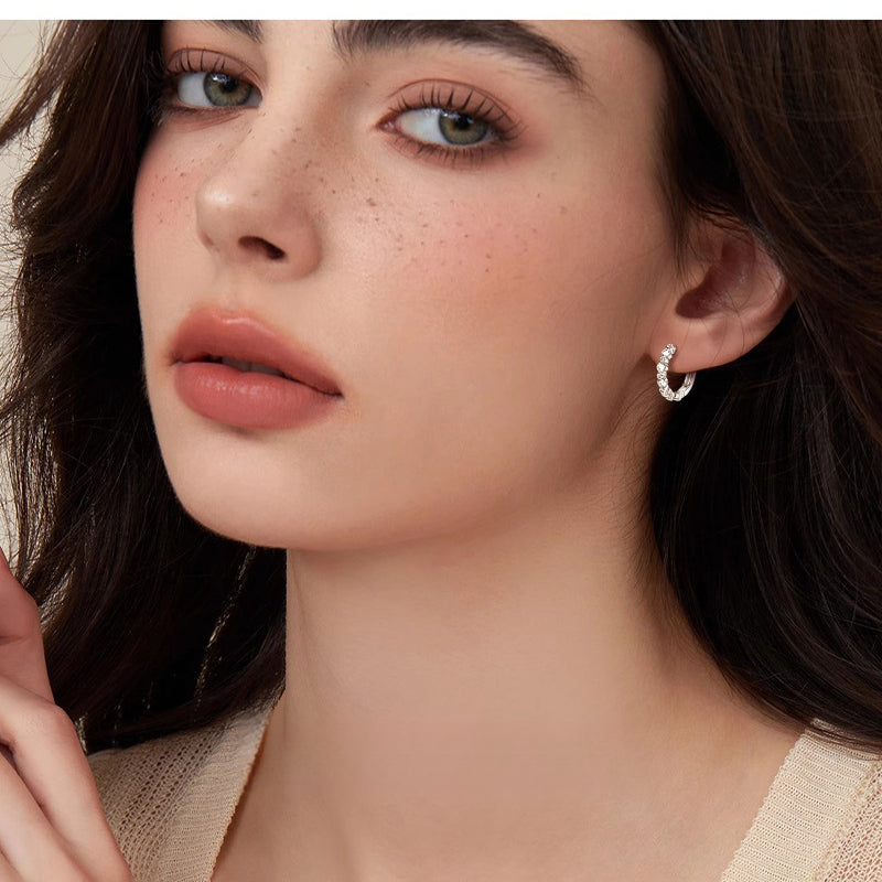 14K gold huggie hoop earrings product detail showing craftsmanship quality
