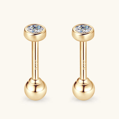 Construction detail of 14K gold moissanite studs emphasizing flat back design for sensitive ears comfort