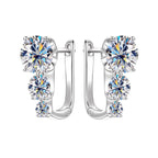 Earrings displayed on white background showing detail