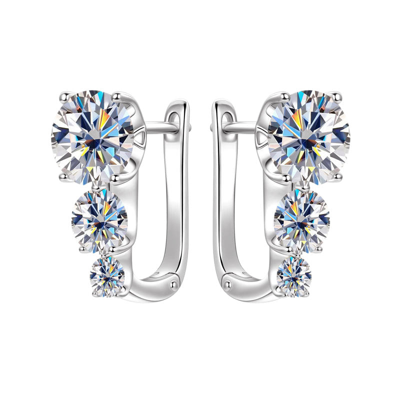 Earrings displayed on white background showing detail