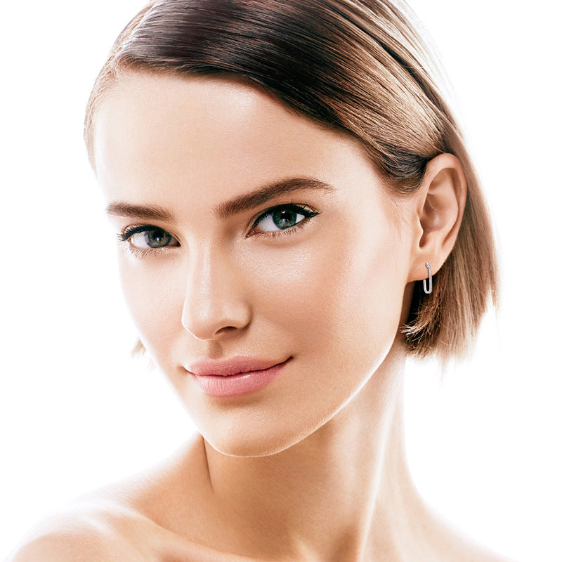 Front view of dangle earrings on model
