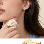 Elegant flower stud earring in sterling silver highlighting moissanite brilliance