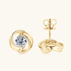 Sterling silver flower stud earring with moissanite center on white background