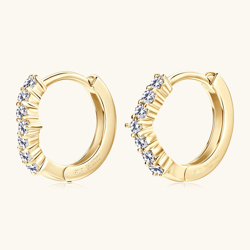 Elegant small hoop earrings on model ear