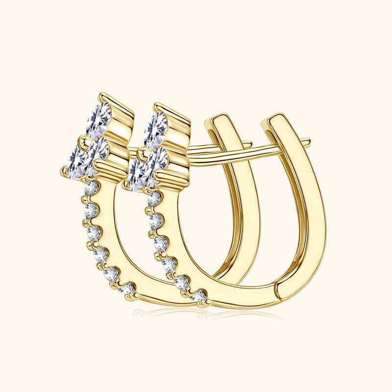 Close-up detail of the three moissanite flower motifs