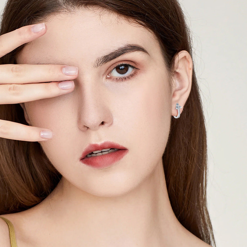 Lifestyle image showing how the earrings can be worn