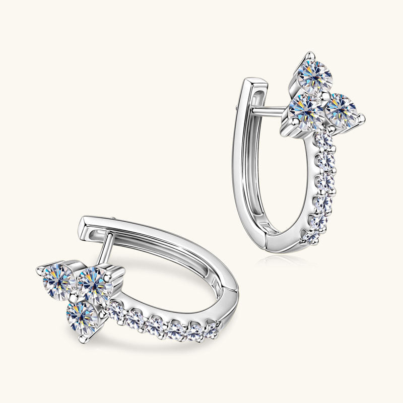 Side angle shot showing the geometric ring and dangle design
