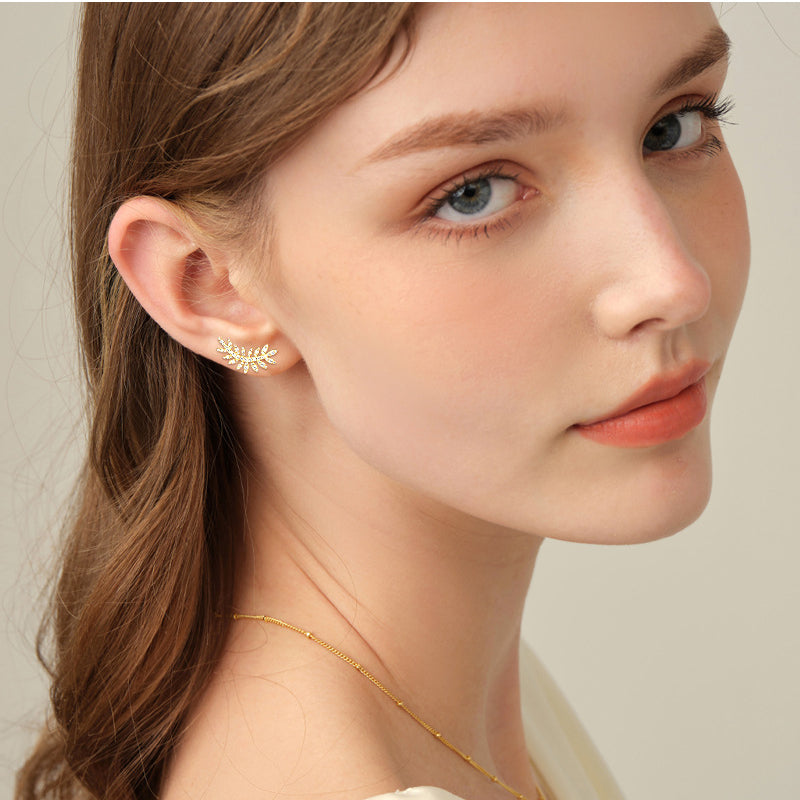Woman wearing botanical sterling silver stud earrings lifestyle photo