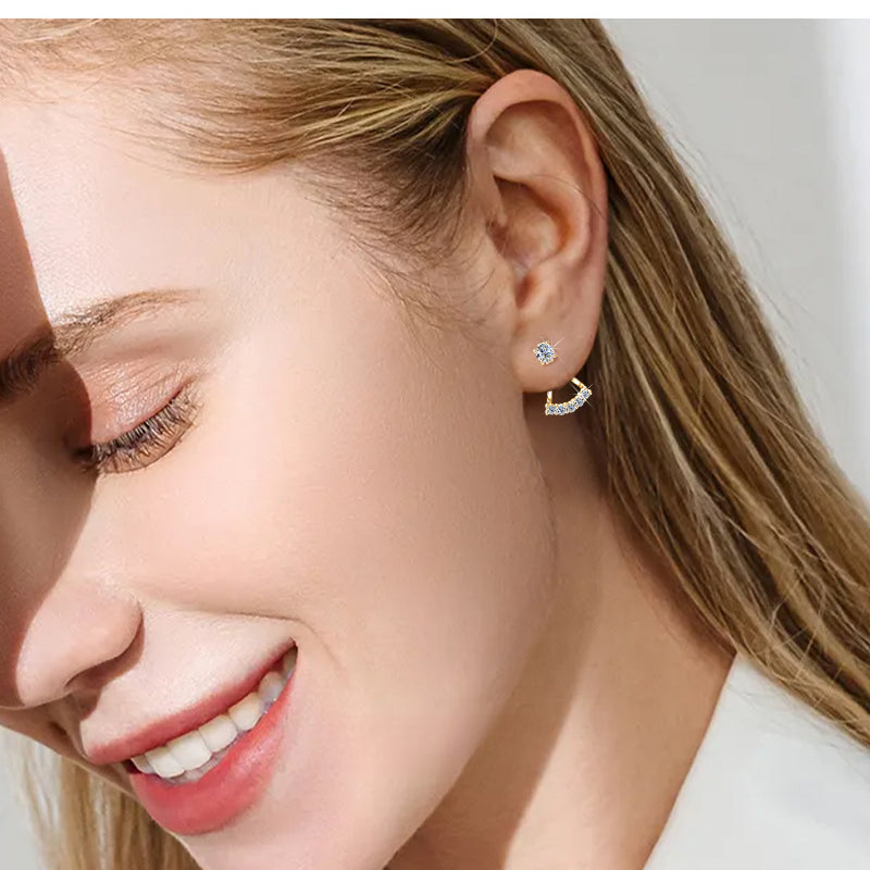 Side profile of butterfly earrings showing dangle and silver design