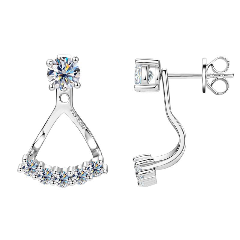 Profile of dangle butterfly earrings worn on ear