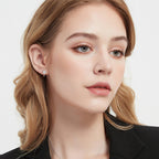 Front view of Luckinging Cross Stud Earrings on a plain background