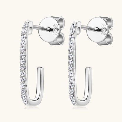 Lifestyle shot of daily wear gold stud earrings styled with casual outfit
