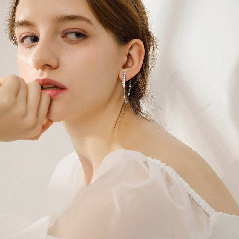 Image of the earrings as a pair on a model or display