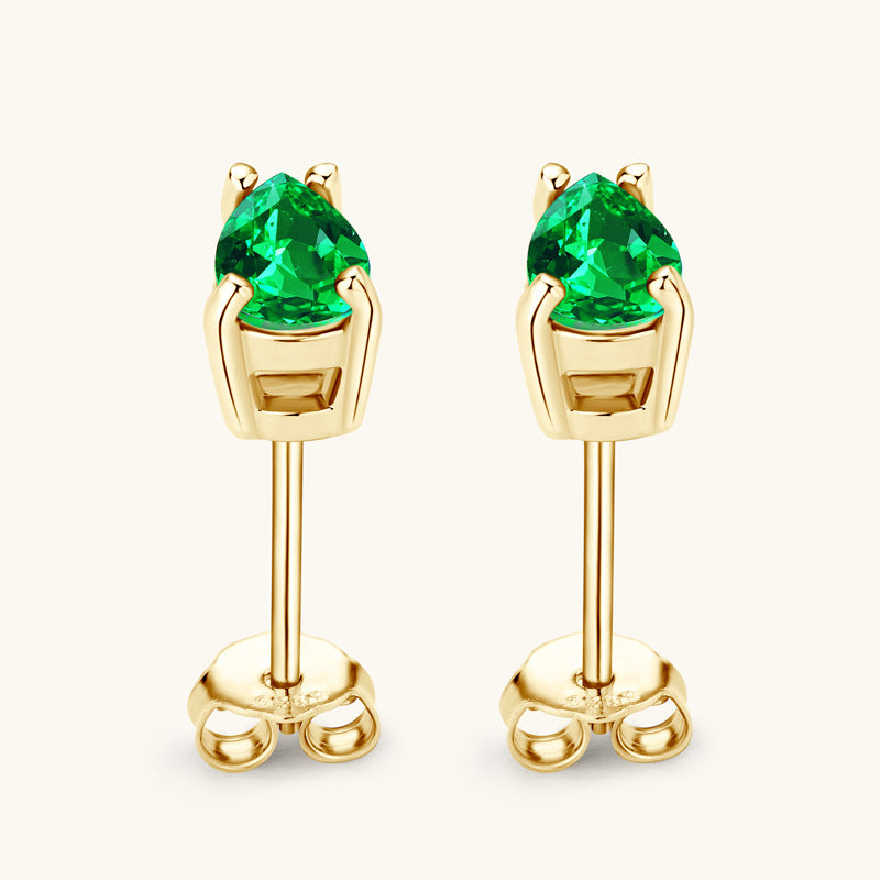 Detail of cubic zirconia inlay in silver earrings