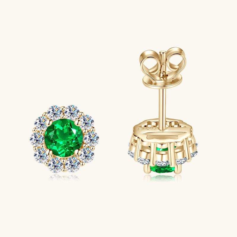 Sterling silver star stud earring with emerald and cubic zirconia from front view