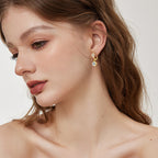 Elegant dangle earring with petal and stone detail