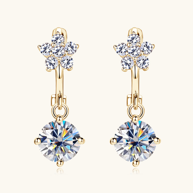 Sparkling moissanite center in floral silver earring