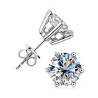 Minimalist flower shaped silver earring with clear gem