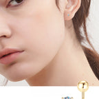 Gold flower stud earring with petal design detail
