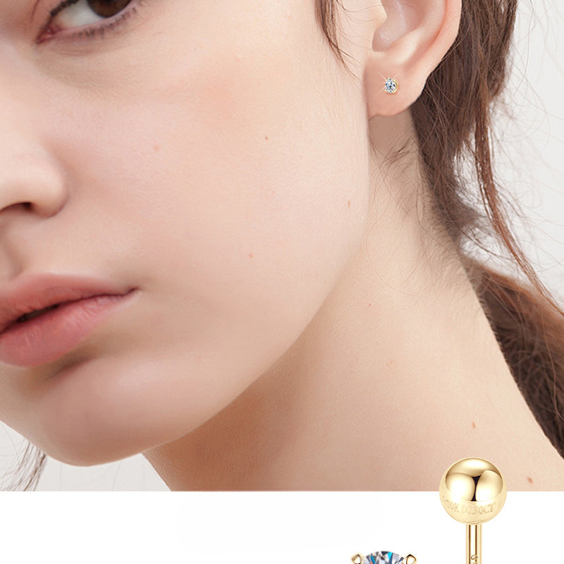 Gold flower stud earring with petal design detail