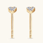 Premium 14K Gold heart stud earrings in natural light