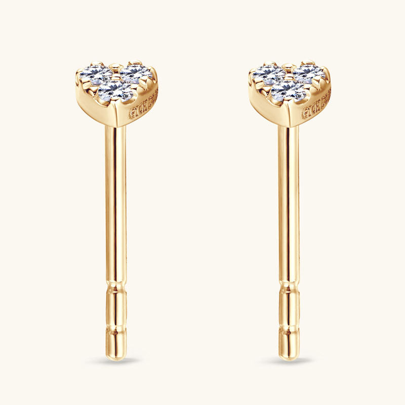 Premium 14K Gold heart stud earrings in natural light