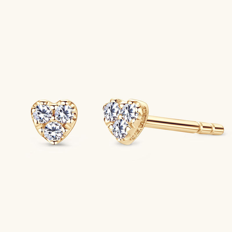 Gold heart stud earrings with clear Moissanite stones