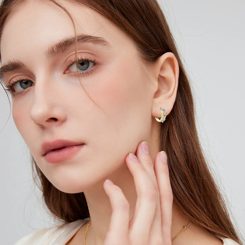 Gold hoop earrings professional wear styling with business attire outfit