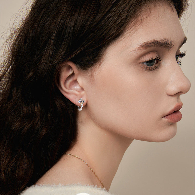 Size comparison of huggie hoop earrings showing 10mm diameter and proportional scaling
