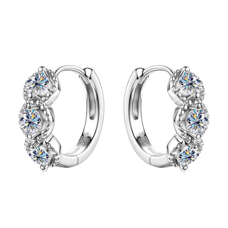 Gold huggie earrings clasp mechanism showing secure closure and comfort design