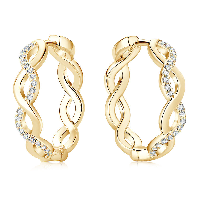 Gold huggie hoops ear stacking jewelry collection