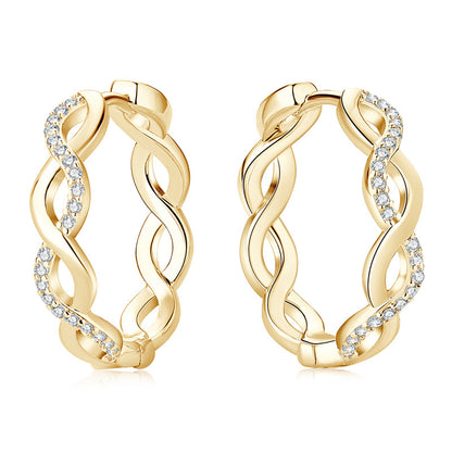 Gold huggie hoops ear stacking jewelry collection