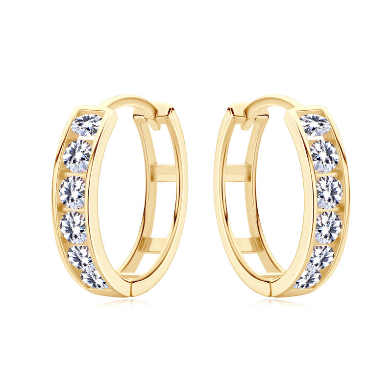 Small gold hoop earrings shown with size reference