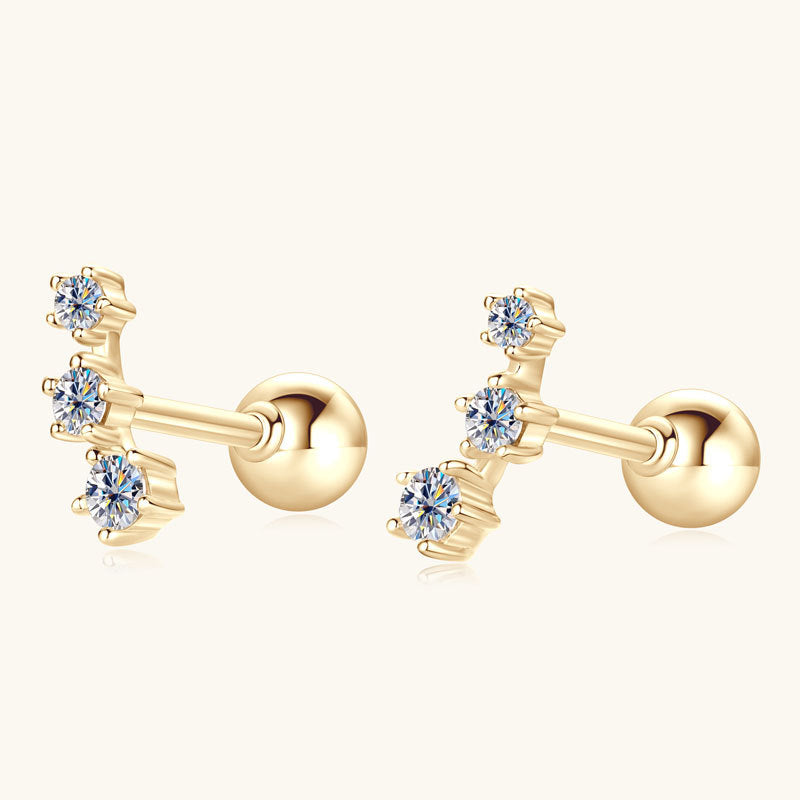 Highlight of 10K gold base with diamond-cut accents on star earrings