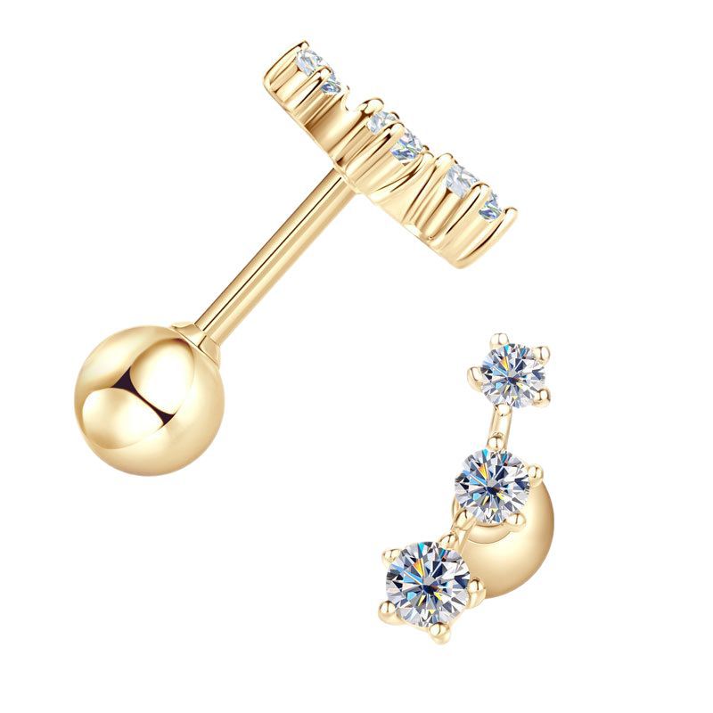 Detailed view of star motif design on gold stud earrings