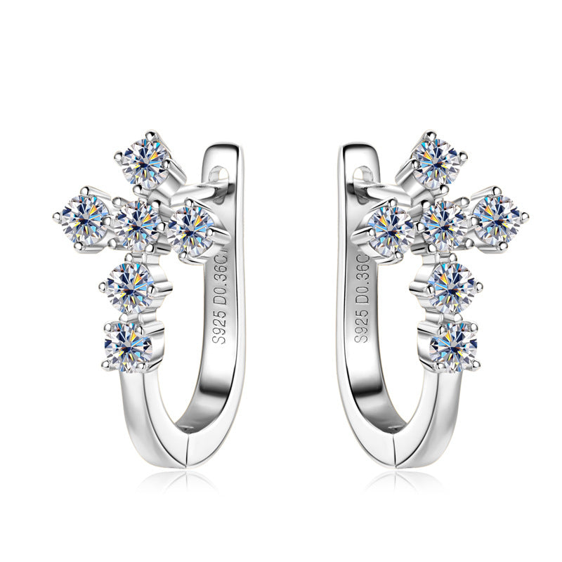 Product showcase of sterling silver stud huggie earrings highlighting premium quality and design