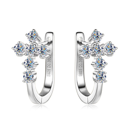 Product showcase of sterling silver stud huggie earrings highlighting premium quality and design
