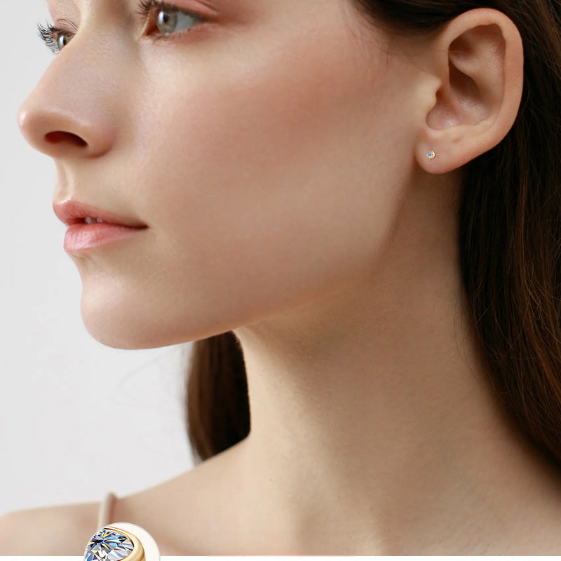Elegant teardrop moissanite stud earring in 10K gold setting
