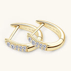 Close-up of moissanite stone detail in huggie earring