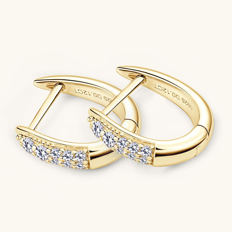 Close-up of moissanite stone detail in huggie earring