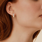Moissanite sparkle detail in huggie earring