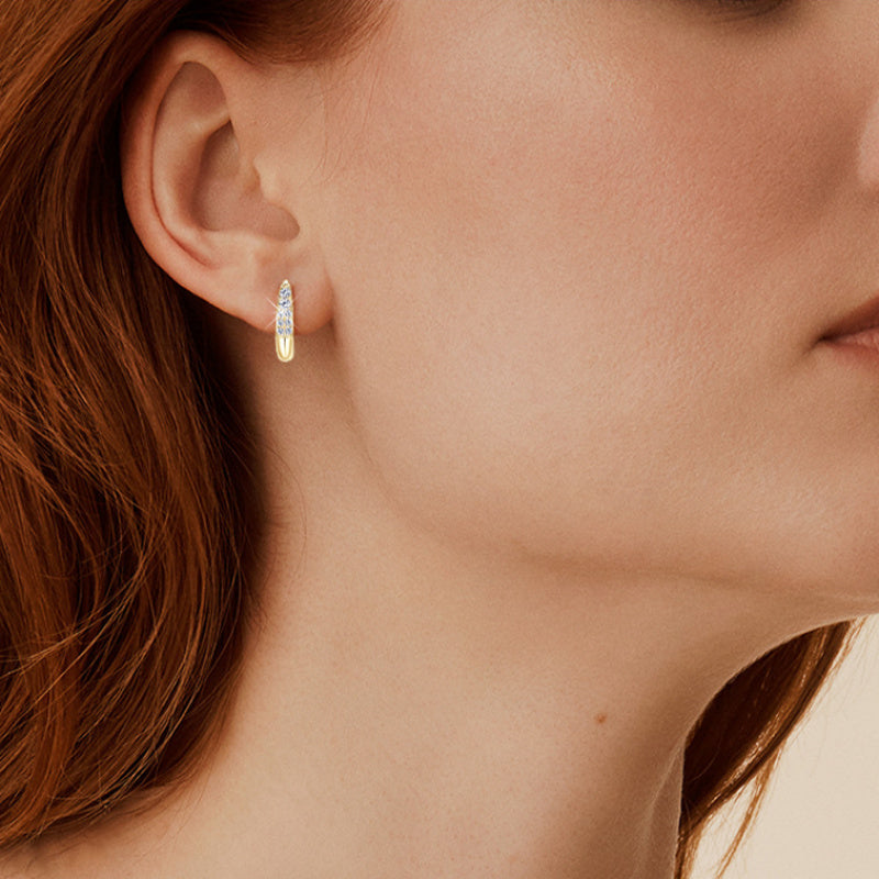 Moissanite sparkle detail in huggie earring