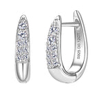 Pair of huggie earrings showing symmetry and fit