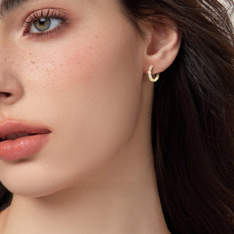 Gold huggie hoop earrings secure hinge closure system for comfortable wear